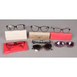 A selection of seven pairs of spectacle frames - comprising of four pairs of designer frames to