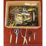 A box containing a large quantity of various sized scissors. (Mostly household). Condition fair.