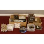 Two boxes of clock parts - comprising of clock keys, locks, ceramic faces and Bezels etc.