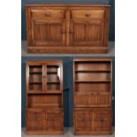 An Ercol golden dawn wall unit. Comprising of one side base unit with cupboard and drawers, one