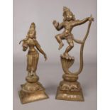 A pair of bronze statues of Hindu deities. Tallest: H: 27cm, W: 8cm. Smallest: H: 23cm, W: 7.5cm.