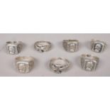 Seven German silver military style rings. 72g.