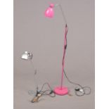 Two lamps - comprising of a pink floor lamp with circular base and a silver coloured desk lamp. Pink