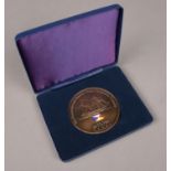 A cased 150 years commemoration P&O medallion.