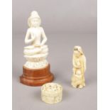 Three 19th Century Ivory Carvings. To include an Indian figure of a meditating Buddha, a small