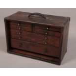 An oak Moore & Wright specimen chest. With metal mounted corners Missing front door.