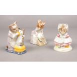 Three Royal Albert Beatrix Potter figures. ' Hunca Munca Sweeping', 'Tabitha Twitchit and Miss