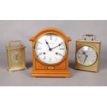 A collection of three clocks. Fox & Simpson mantle clock, Bentima & President quartz carriage