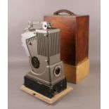 A vintage Specto projector in wooden case.
