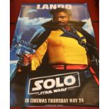 A very large 'Lando' poster from the Star Wars film 'Solo'. H: 239cm, W: 153cm. The poster has small
