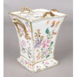 An antique Chinese export porcelain vase. With gilt and hand painted floral decoration. There is a