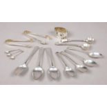 A good collection of silver. Includes spoons, sugar tongs, napkin ring.