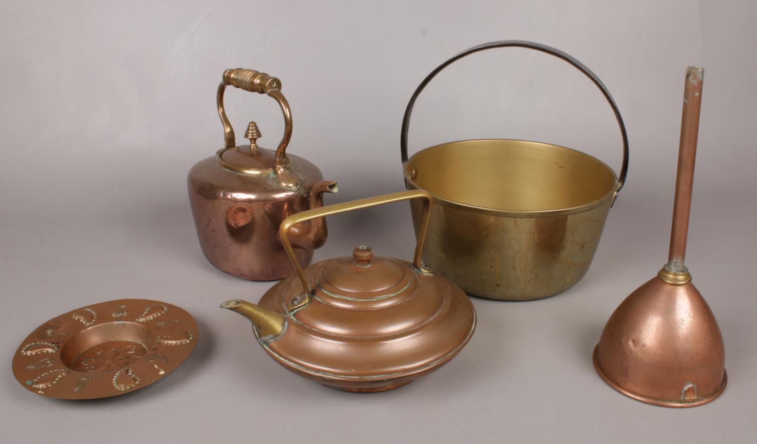 A quantity of mostly copper. Including teapot, brass jam pan, small hammered copper dish impressed