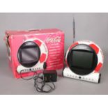 A vintage boxed Coca-Cola soccer ball 5" LCD TV.