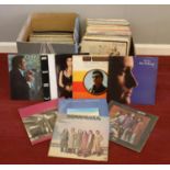 A quantity of vinyl LP records. Cher, Johnny Cash, Phil Collins, Roy Orbison examples etc.