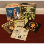 A collection of 45 rpm vinyl records. The Beatles, Diana Ross, David Cassidy examples etc.