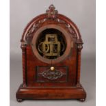 A carved mahogany dome top mantel clock case with S.Thomas movement. Missing back feet, Some