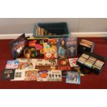 A box of LP's, singles and case of cassettes, to include artists such as The Beatles, T.Rex, Billy