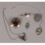 A quantity of silver. To including badge, assayed Edinburgh 1939, pendant, Mackintosh style rose