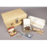 A jewellery case and contents. Includes 9ct gold and pearl earrings, thistle brooch, military