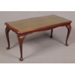 A Mahogany inset leather/glass top coffee table. (95cm width 44cm height)