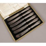 A set of 6 silver handled butter knives. Assayed Sheffield 1922 by William Yates Ltd.