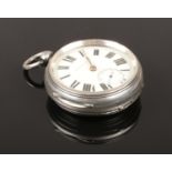 A Victorian silver pocket watch. Assayed Birmingham 1876 by William George Hammon. Not running.