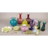 A quantity of coloured art glass. Including jugs, epergne flute, vases, etc. Crack and repair to red