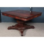 A regency mahogany centre pedestal dining table. (76cm x 139cm x 109cm)