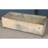 A large galvanised metal feeding trough. (40cm x 123cm x 51cm)