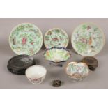 A collection of mostly oriental ceramics. Including 19th century Chinese celadon plates, wooden