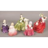 Five ceramic Royal Doulton lady figures. One in green dress cracked right through.