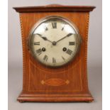 A Philip Haas & Sohne inlaid oak 8 day mantel clock. Movement marked PHS.