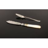 Two silver pieces of cutlery. A mother of pearl handled knife with engraving detailing, assayed