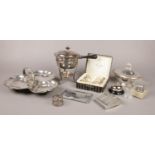 A collection of silver plated items. Includes crested tureen, Arthur Price napkin rings, egg coddler