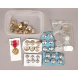 A quantity of medals and buttons. Including WWII Civil Defence buttons, East Riding of Yorkshire,