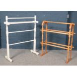 Two towel rails. Including painted and pine examples. Painted example foot loose.