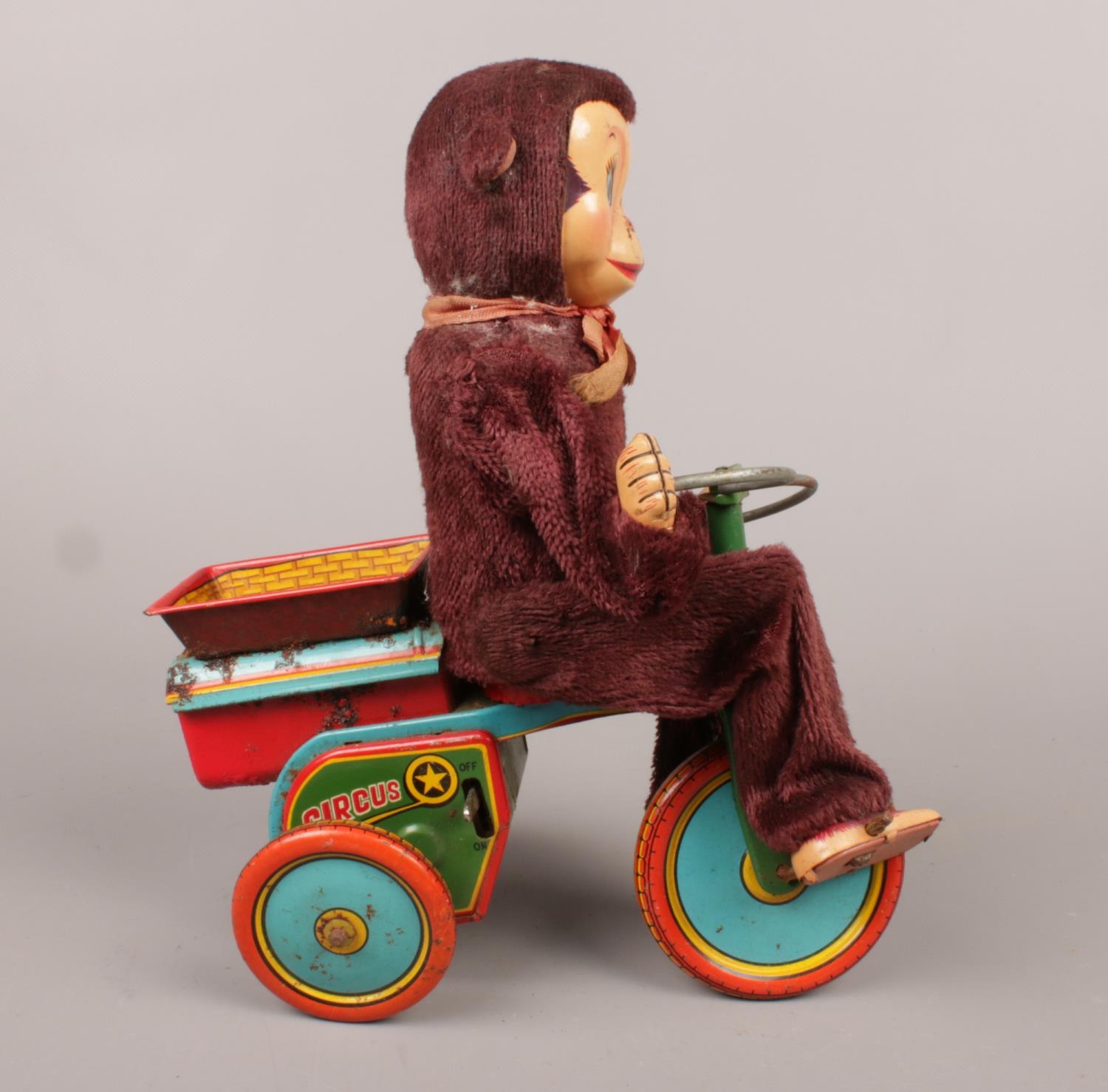 A Japanese made monkey on a tin plate tricycle. H:22cm, W: 10cm. Condition fair. Will need some - Image 2 of 4