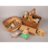 Two baskets of collectables. Includes rocking horse, antique clothes pegs, snow globe, strip