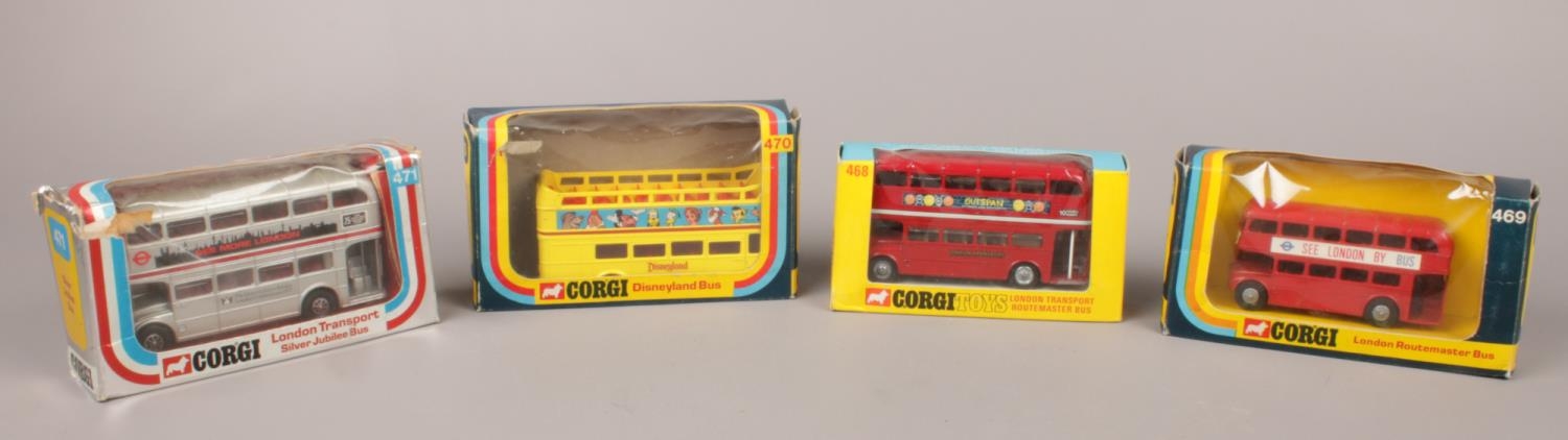 A collection of four boxed Corgi buses - comprising of Silver Jubilee Bus (471), two London