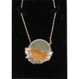 An agate and silver pendant on silver chain. The pedant assayed Edinburgh 1981 by Michael Wallis