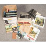 A box of railway books and ephemera.