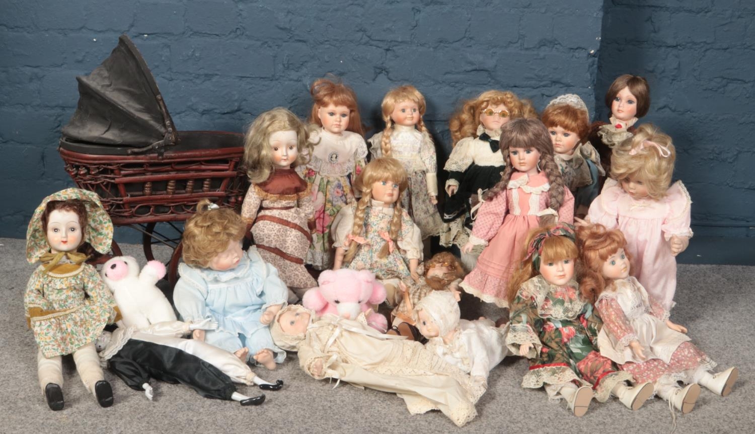 A collection of porcelain dolls, Danbury Mint, Alberon designs examples to include a vintage style