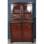 A Victorian carved mahogany chiffonier with glazed top. (190cm x 108cm x 51cm)