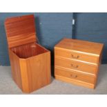 A teak G Plan EGomme Garrick chest of three drawers (64cm x 70cm x 46cm) along with a matching linen