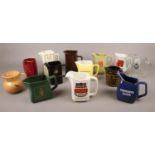 A collection of ceramic Advertising jugs. Tennent's Lager, Tia Maria Liqueur, John Player Special,