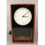 A mahogany cased Smiths electric clock.