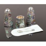 A New Zealand three piece sterling silver cruet set. By Ataahua with Paua/abalone shell decoration.