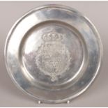 A heavy pewter dish. Marked with man on horseback to the reverse.