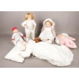 A collection of porcelain dolls. Knowles 'Michael' 'Elizabeth Homecoming' .Heritage Dolls 'Jennifer'